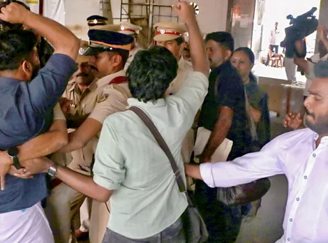 protest against veena george